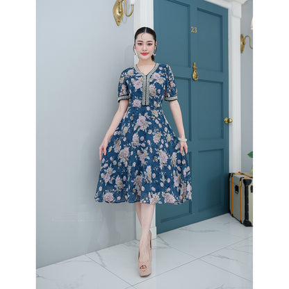 kudapy Mini dress, floral chiffon fabric, flared skirt, doll sleeves with pearl accessories at the cuffs, V-neck decorated.